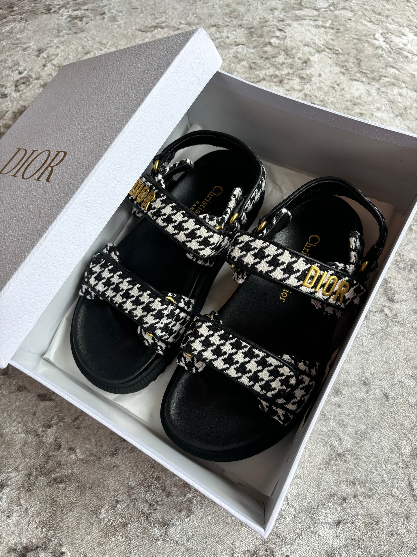 Black & white sandals in stock