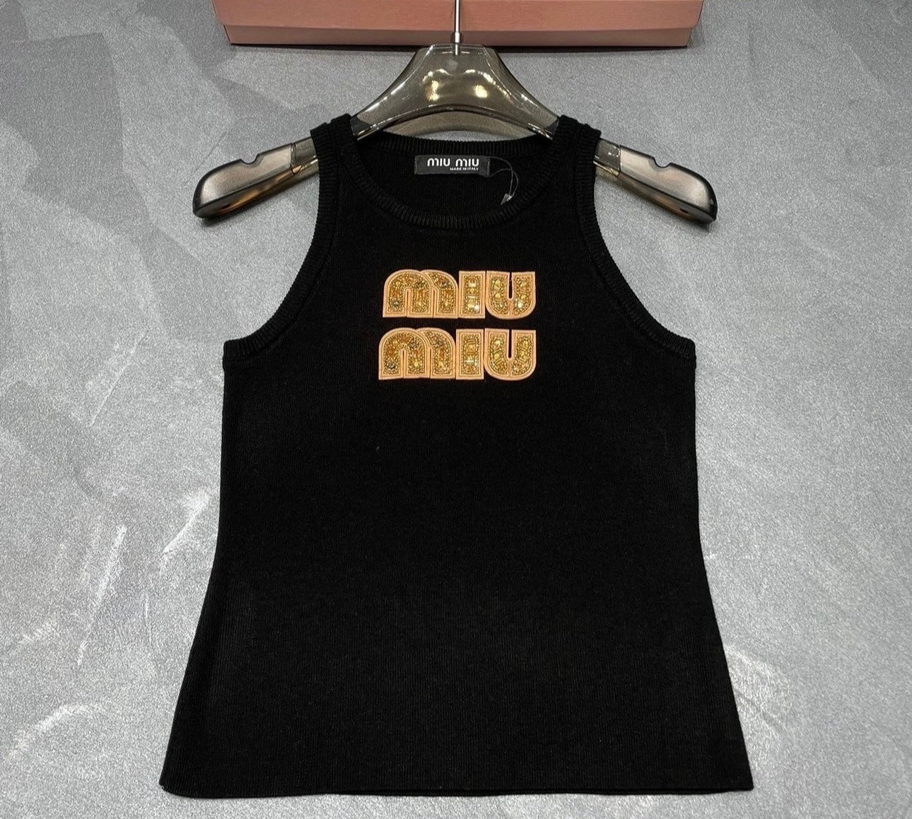Black vest top in stock