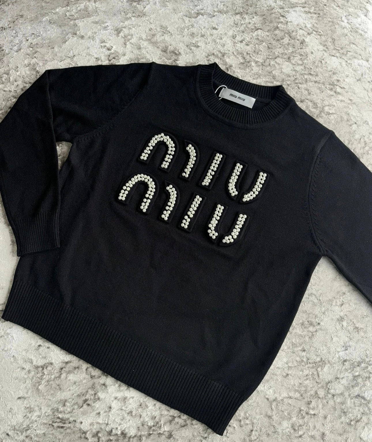 Black pearl jumper