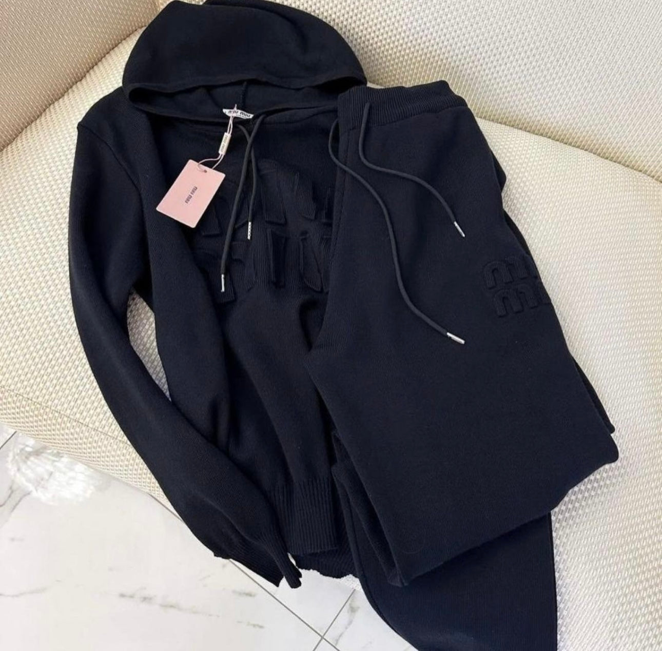 Black tracksuit in stock