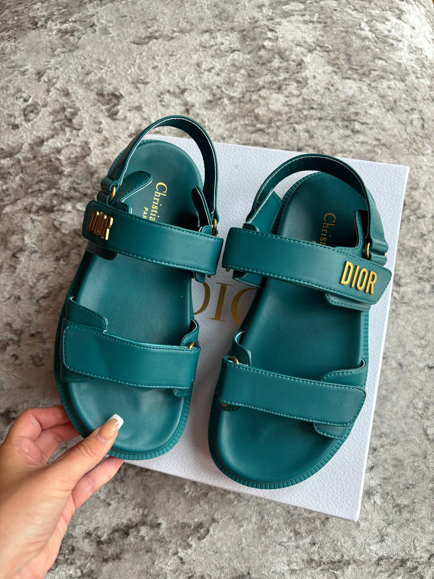 Blue/green sandals in stock