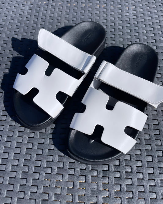 White & black sandals in stock